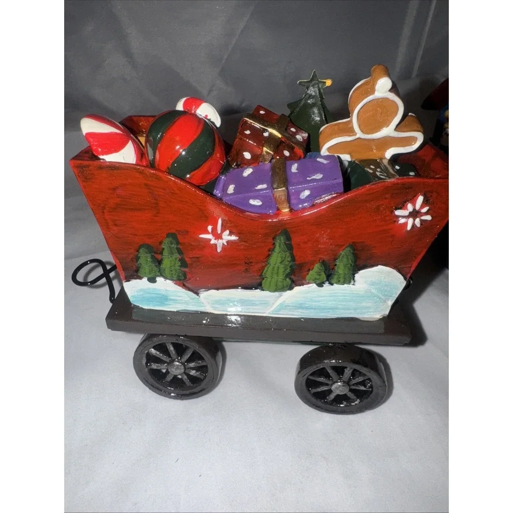 Sterling 3 Piece Resin  Santa,‎ Snowman and Tree Christmas Train Set.
